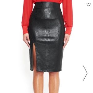 Bebe Faux snake Midi skirt. Brand new with tag
